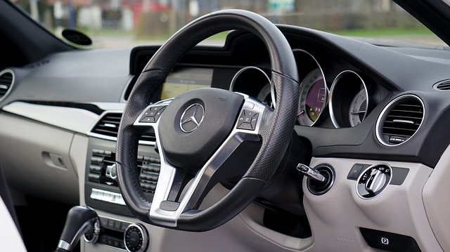 Car steering wheel and dashboard.